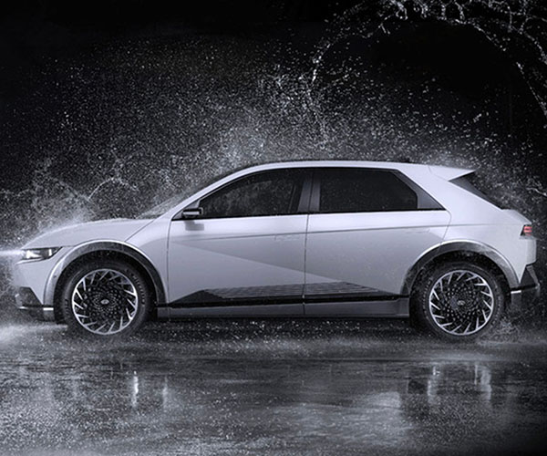 Car driving through high level of water in extreme weather